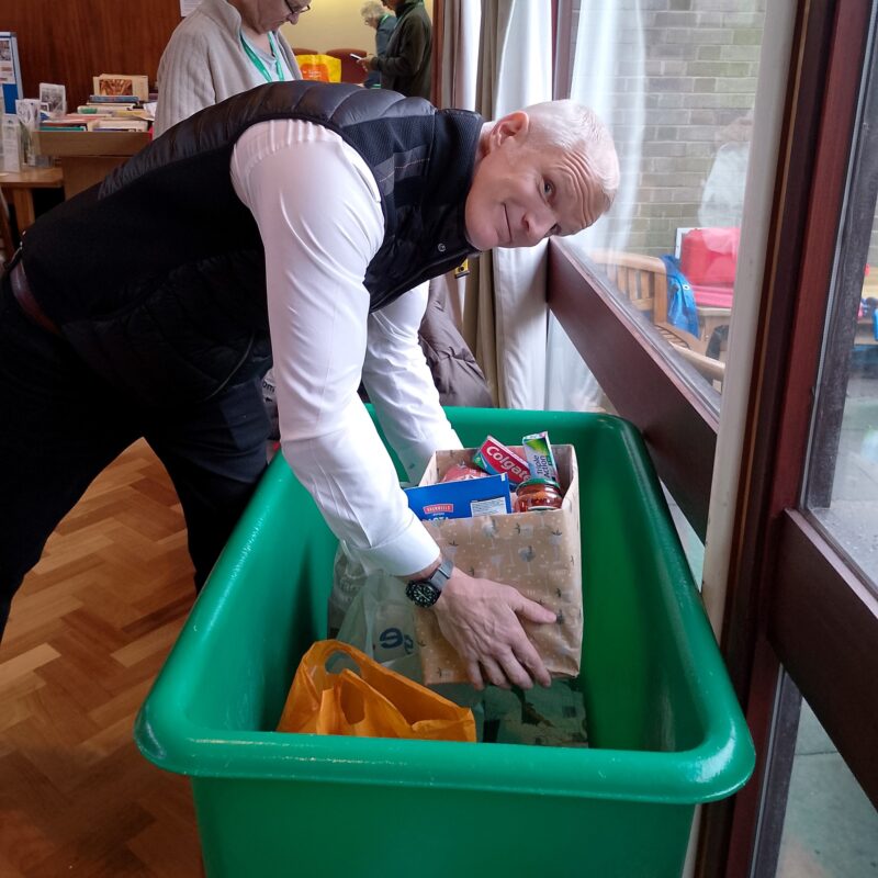 Al donating to the B30 Foodbank